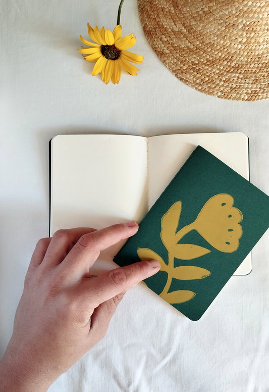 Green Notebook with Yellow Flower