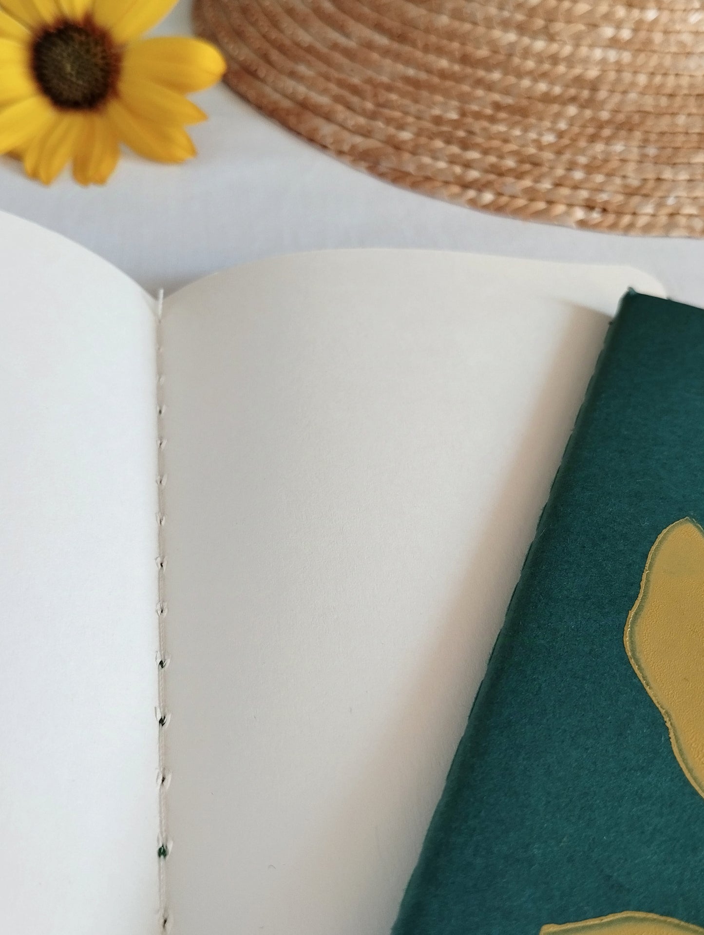 Green Notebook with Yellow Flower