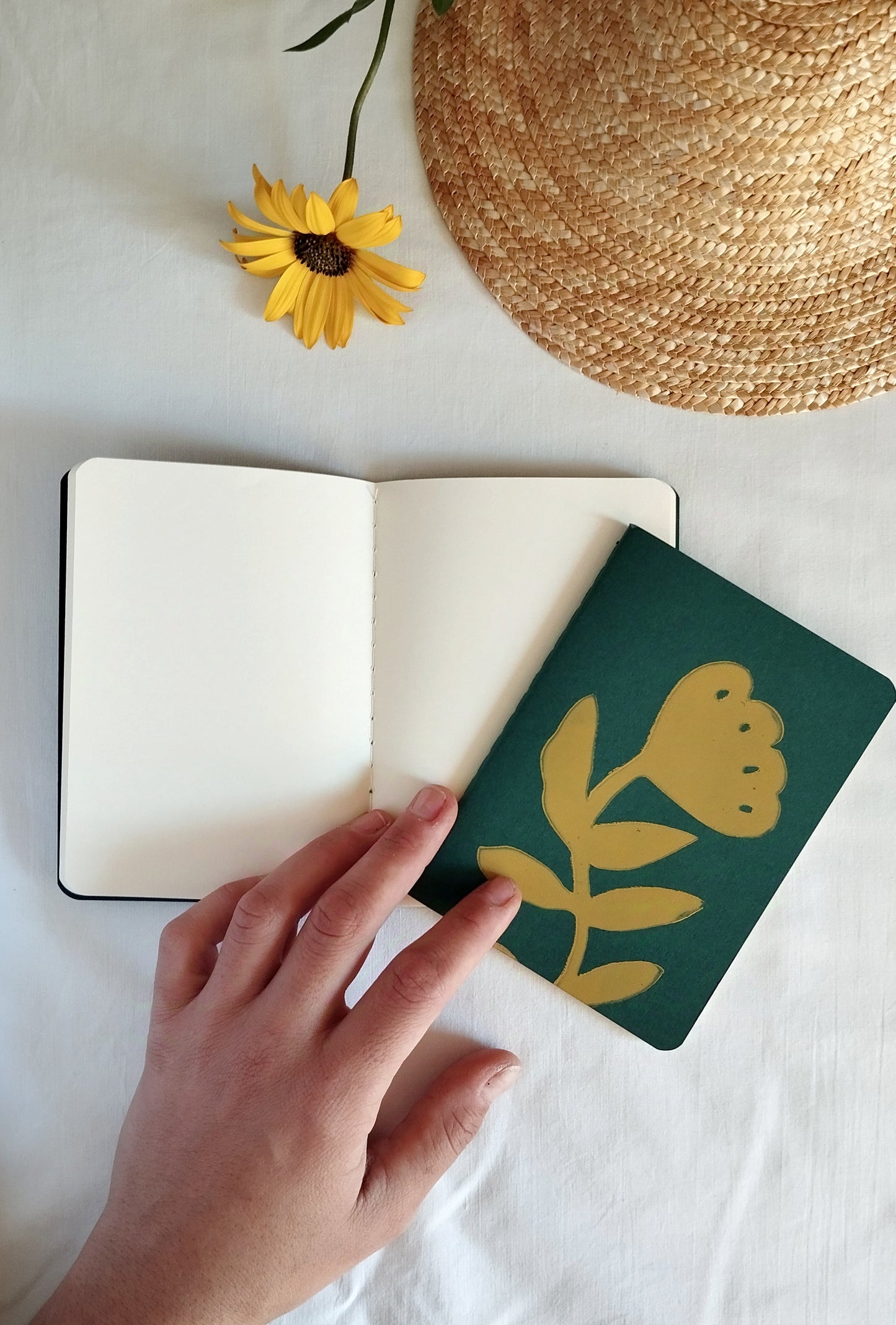 Green Notebook with Yellow Flower