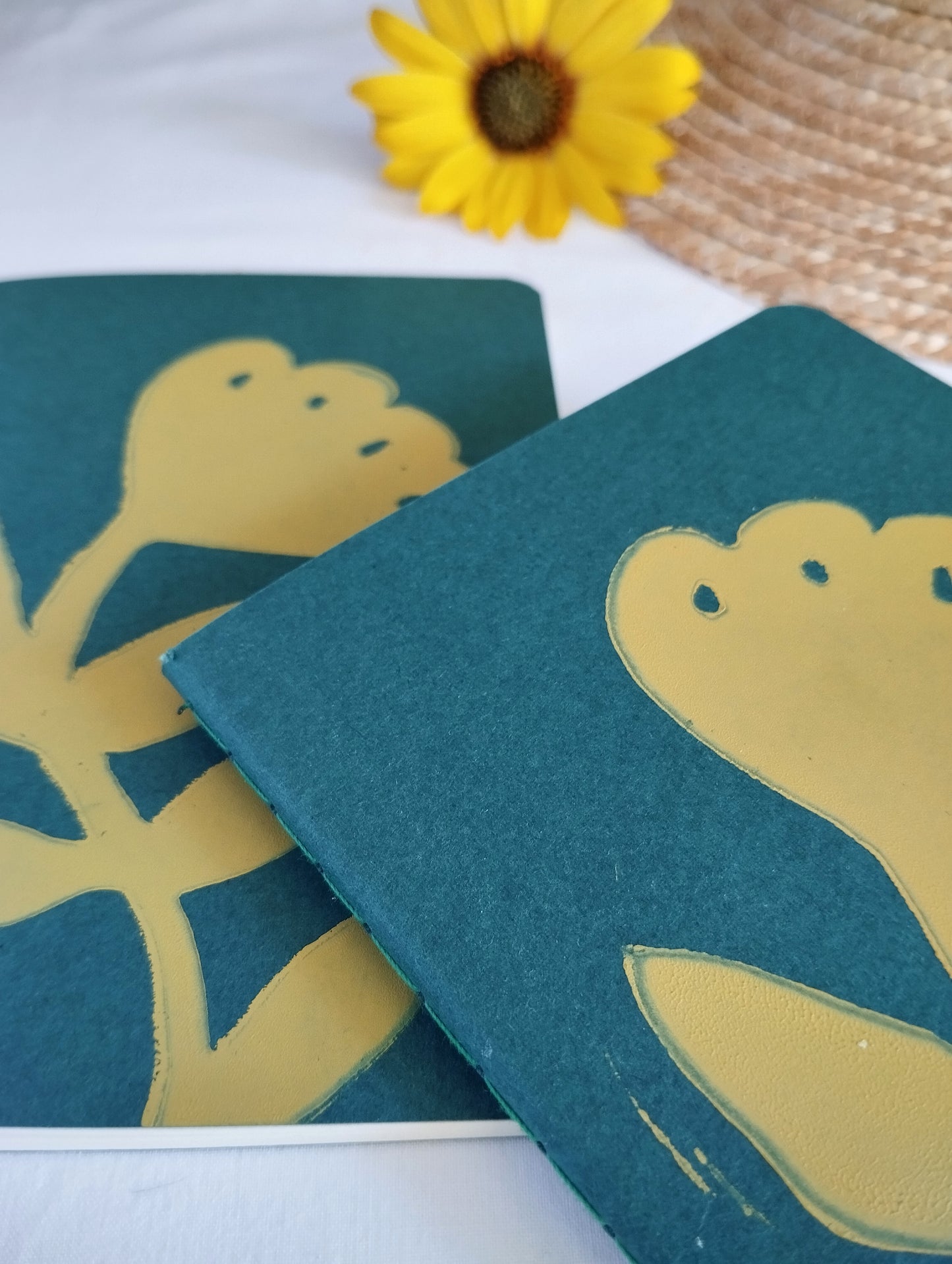 Green Notebook with Yellow Flower