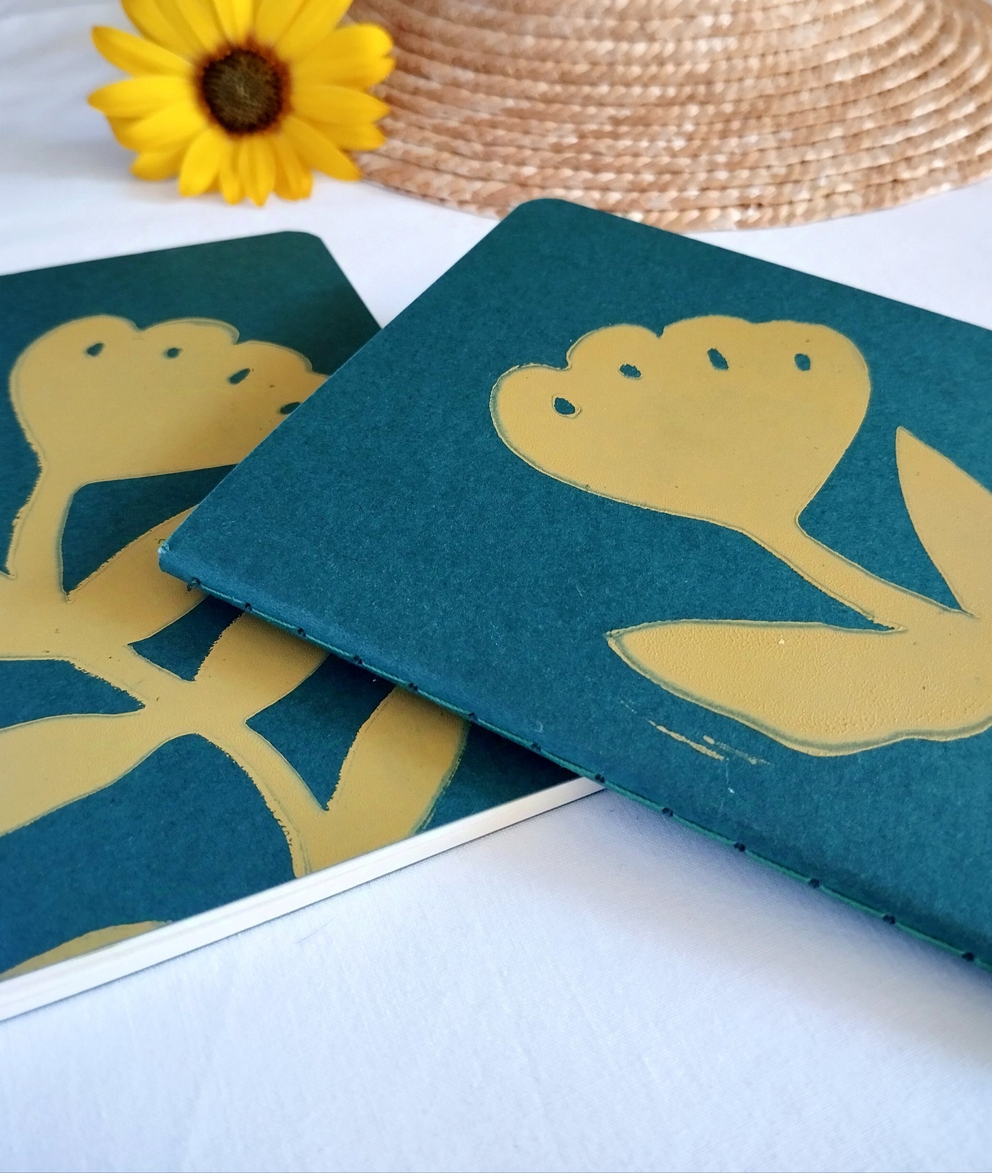 Green Notebook with Yellow Flower