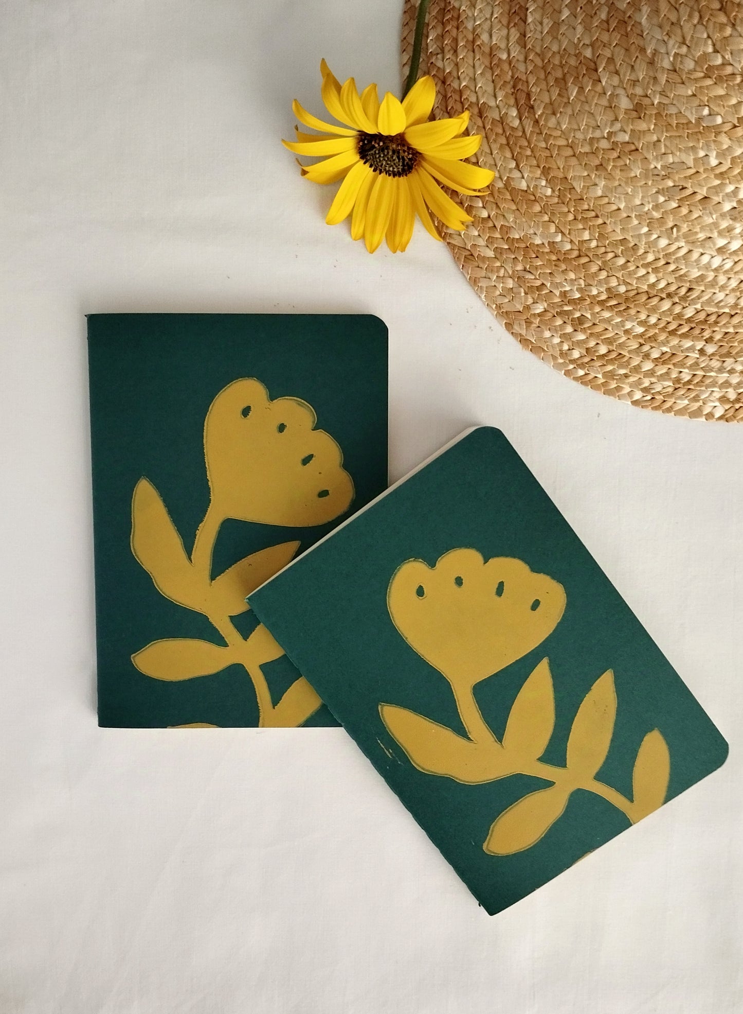 Green Notebook with Yellow Flower