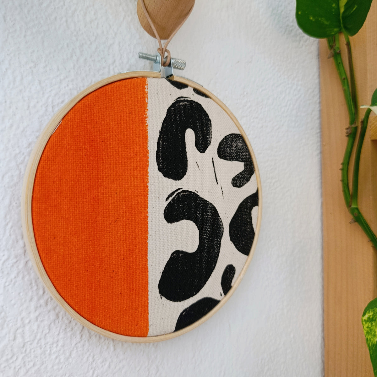 Orange and Black Animal Print Wall Hanging