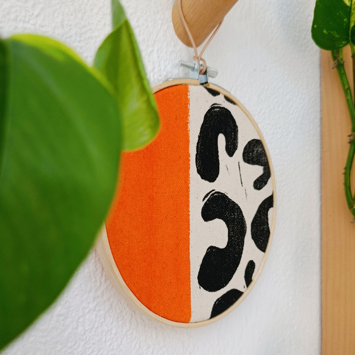 Orange and Black Animal Print Wall Hanging