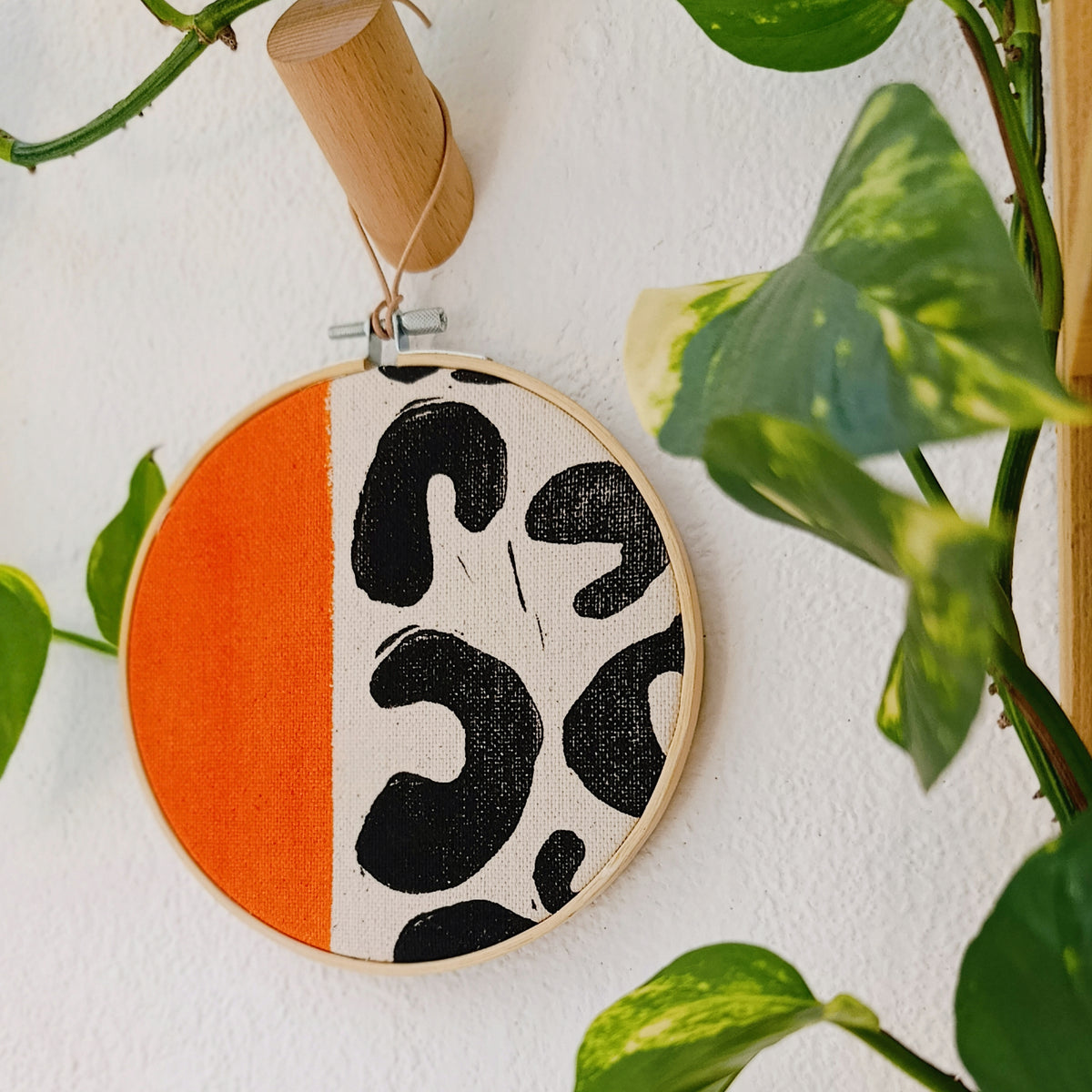 Orange and Black Animal Print Wall Hanging