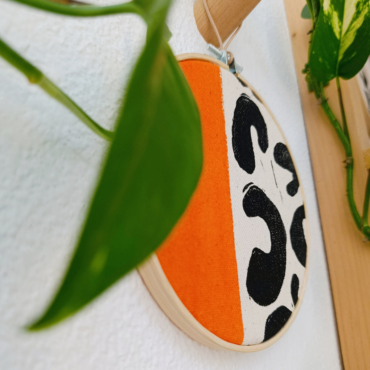 Orange and Black Animal Print Wall Hanging