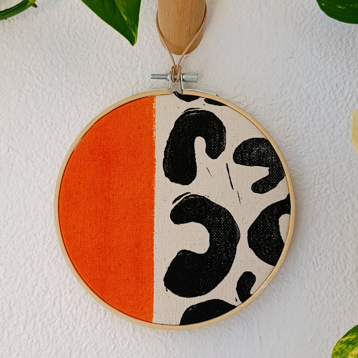 Orange and Black Animal Print Wall Hanging